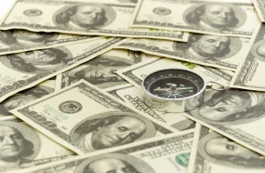 Dolar amerykański drożeje na świecie, lecz złotówka broni pozycji wobec USD